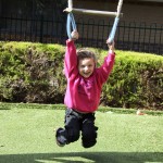 Having fun on the swing set